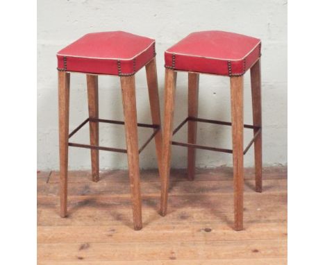 Pair of vintage red vinyl covered high bar stools 