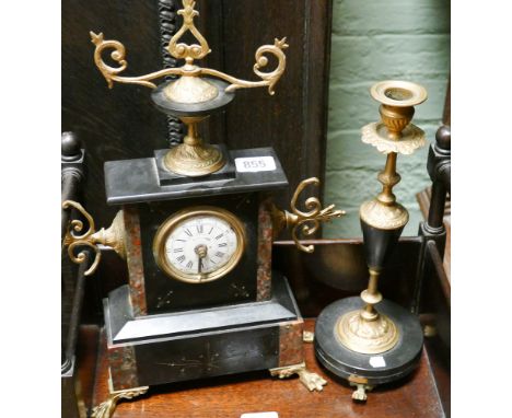 Black French marble and gilt decorated mantel clock with similar candlestick 