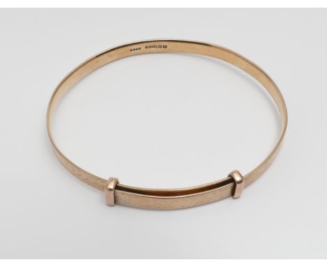 9ct gold ladies adjustable bangle 16.2g