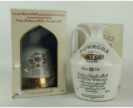 2 Decanter bottles Fine Blended and Single Malt Whisky (in OPC's) comprising: 1 Decanter Bowmore 15yo together with 1 Decante