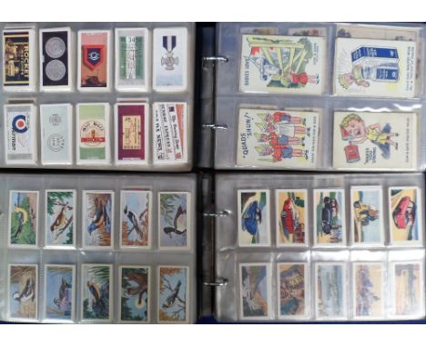 Trade cards, a collection of part sets &amp; odds with initials ranging between C-K, organised alphabetically in 6 modern alb