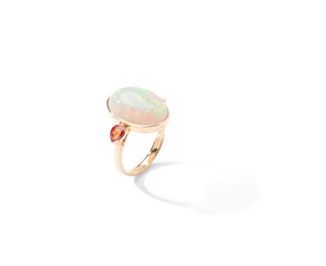 An opal and coloured sapphire ring The oval cabochon opal collet-set between pear-shaped orange sapphire shouldersDimensions: