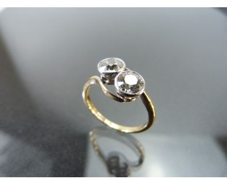 18ct Gold and 18ct Platinum Two Stone diamond ring of Old Brilliant cut diamonds approx 0.75ct each.