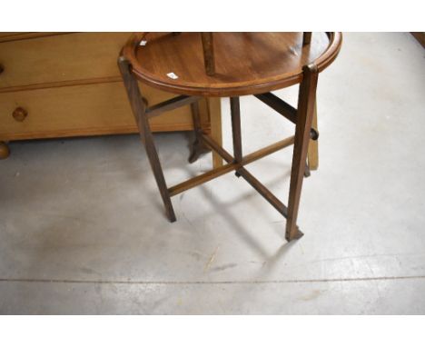 An early 20th Century oak 'Revertable' card/tea table, diameter approx. 61cm