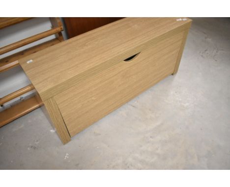 A beech effect laminate shoe bench having drop front, width approx. 100cm