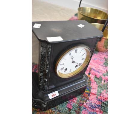 A Victorian black slate mantel clock