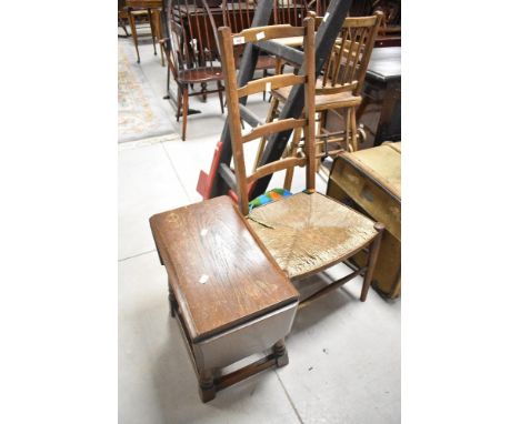 An Old Charm style occasional table having drop leaves and a 19th Century rush seated ladder back chair