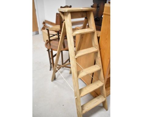 A set of vintage stripped step ladders
