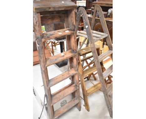 Three sets of vintage step ladders
