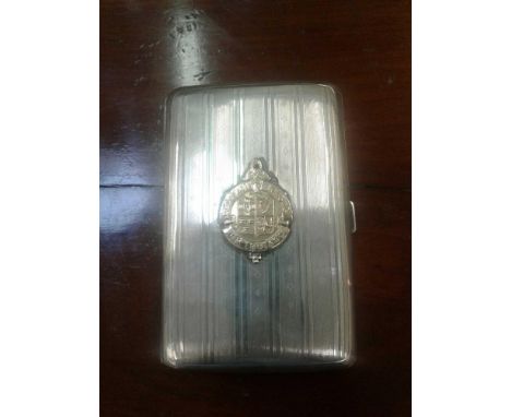 in the traditional taste, the silver engine turned plate mounted with a gold medal