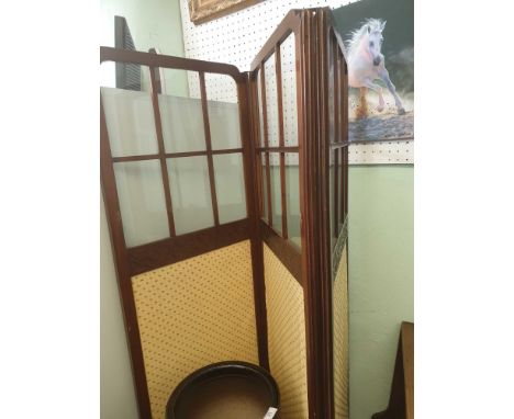 the glazed panel top above a tapestry base, all contained in a rectangular frame
