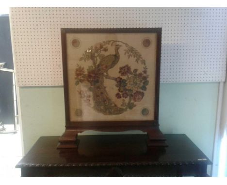 the needlework panel contained within a square frame on bracket feet