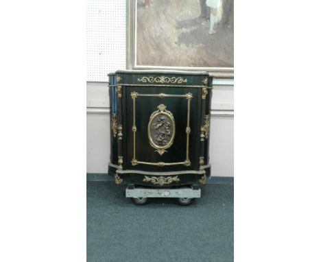 of shaped rectangular form, the marble top supported by a serpentine frieze with ormolu decorations above a curved panel door