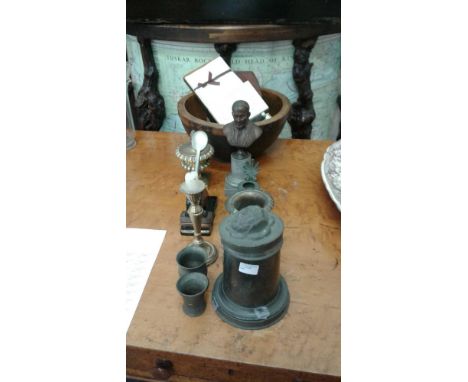 including a Romanesque oil lamp, candlesticks, measures, company seal and other wares