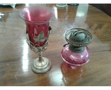 together with an oil lamp reservoir