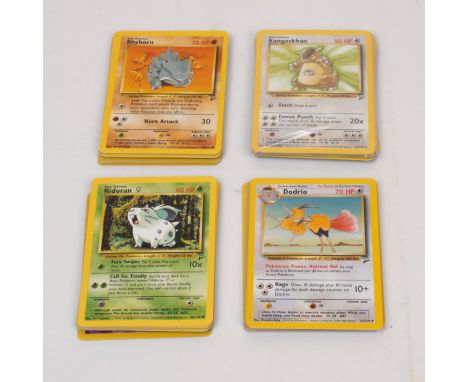 This lot contains just under 70 cards from Base Set 2, released in the year 2000. It includes a number of holographic cards s