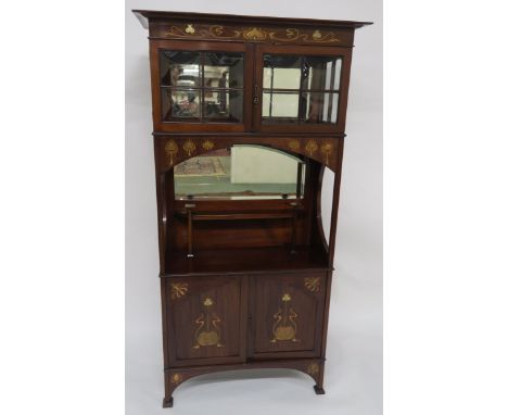 A GLASGOW STYLE MAHOGANY AND MARQUETRY DISPLAY CABINET with overhanging cornice above bevelled glass doors and side panels, t