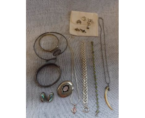 A SILVER BANGLE and a collection of similar jewellery