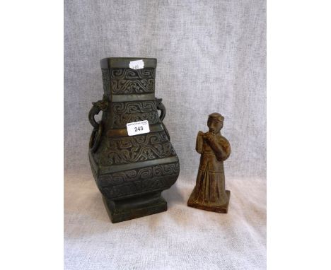 A CHINESE BRONZE VESSEL with twin ring-handles and an archaic ceramic figure of a flute player