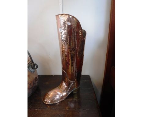 A COPPER STICK-STAND in the form of a boot, 22" high