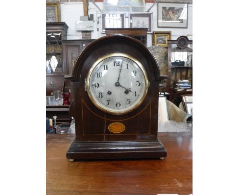 AN EDWARDIAN MAHOGANY MANTEL CLOCK