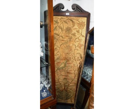 AN EDWARDIAN MAHOGANY THREE-FOLD SCREEN with inset needlework panels, each section, 64.5" high x 23" wide 