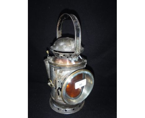 RAILWAY INTEREST: A VINTAGE B.R. (W) HAND HELD RAILWAYMAN'S LAMP with triple coloured revolving lenses