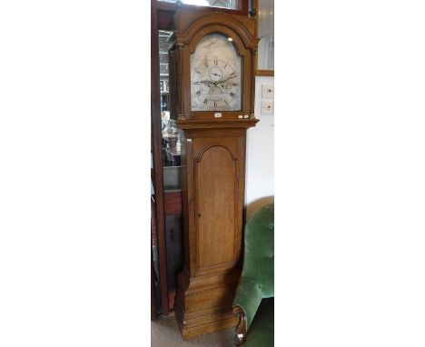 A GEORGE III OAK LONGCASE CLOCK, the arched silvered dial signed 'Jacob Mickelfield, Goldhanger', the dial decorated with bui