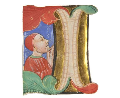 *Illuminated initial. An illuminated, historiated initial "I" on vellum, Italy, circa 1450,  the initial in gold, pink and wh