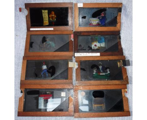 A COLLECTION OF 19TH CENTURY MAHOGANY FRAMED MAGIC LANTERN SINGLE AND DOUBLE SLIPPER SLIDES of comic scenes including 'Notice