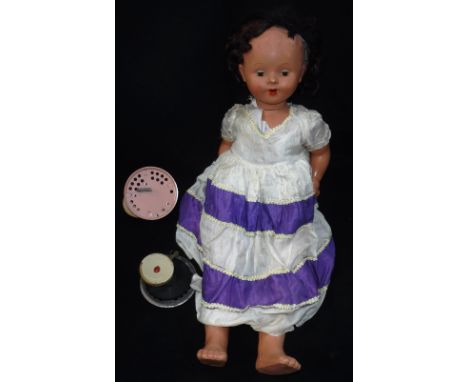 A LARGE VINTAGE COMPOSITE DOLL with musical inset record player with miniature records (2 players)