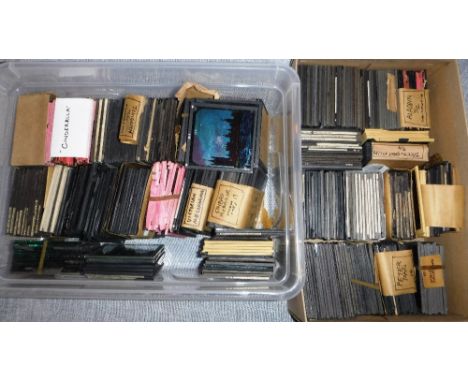 A LARGE COLLECTION OF LATE 19TH/EARLY 20TH CENTURY MAGIC LANTERN SLIDES including shipwrecks, Robinson Crusoe and others simi