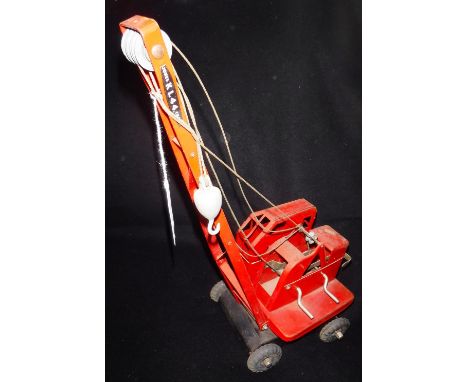 TRI-ANG: A RED TIN-PLATE KL CRANE 44, model of the 4 ton mobile crane, made by K & L Steelfounders & Engineers Ltd of Letchwo