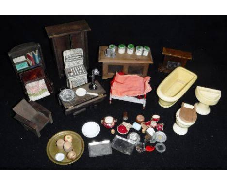 A COLLECTION OF VINTAGE 1930s DOLL'S FURNITURE to include a yellow ceramic bathroom suite, wooden furniture, a gas cooker, ti