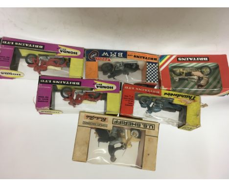 Britains toys, boxed, a collection of Motorcycles including Honda, Harley Davidson, BMW, etc