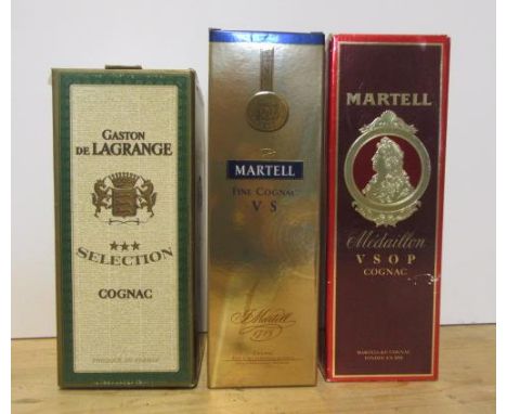 One bottle Martell V.S. Cognac and one bottle Martell Medaillon Cognac, and one bottle Gaston de Lagrange Cognac, all boxed (