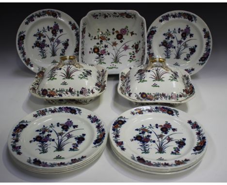 A Spode part dinner service, early 19th century, decorated with sprays of stylized flowers, comprising two square tureens and