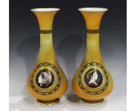 A pair of orange ground opaline glass vases, circa 1860, the pear shaped bodies with flared trumpet necks, both decorated wit