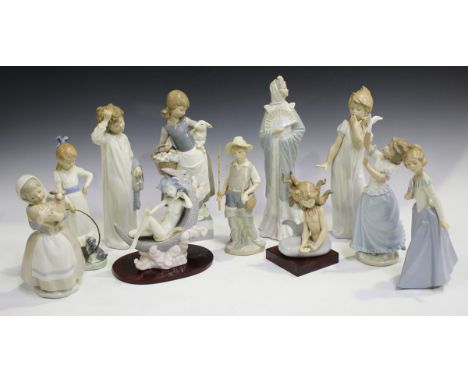 Four Lladro figures, comprising Mirage, No. 1415, Moon Glow, No. 1436, Girl with Lamb, No. 4835, and Going Fishing, No. 4809,