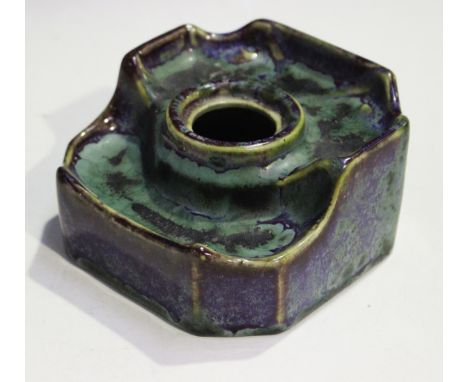 A Dalpayrat stoneware inkwell, circa 1900, of square, stepped shape with canted corners, covered in a flambé glaze with green