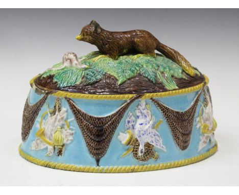 A George Jones majolica game pie tureen, cover and liner, circa 1870, of oval shape, the turquoise glazed body relief decorat