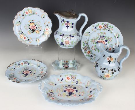 A small group of Ridgway blue glazed pottery, 1830-40, enamelled and gilt with flowers and foliage, including a jug with pewt
