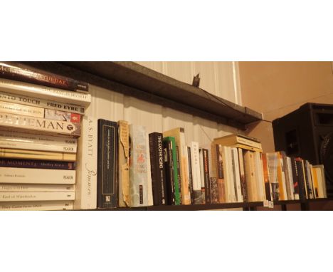 Shelf of paperback novels ( top shelf )