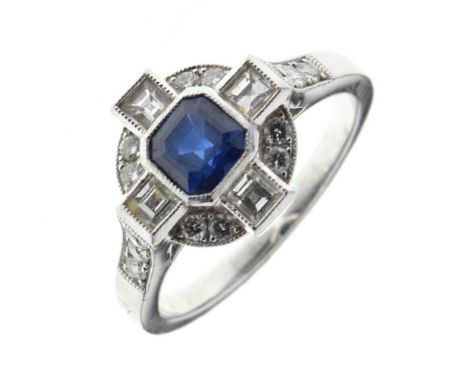 Sapphire and diamond ring, the white mount unmarked, the square cut stone with square cut diamonds to the compass points, bri