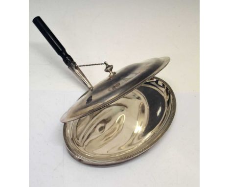 George III silver cheese toasting dish of oval form having a domed hinged lid with urn finial and turned wooden handle, spons