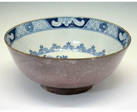 18th Century Delftware footed punch bowl, probably London circa 1770, painted in blue to the interior with a floral bouquet, 