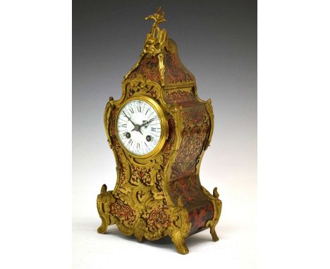 Late 19th Century French red boulle mantel clock, with 8.5cm moulded sectional dial, two-train movement stamped 'Sonnerie Pro