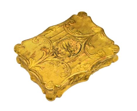 Victorian silver gilt vinaigrette of shaped rectangular form, the exterior having engine turned decoration within floral scro