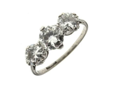 Three stone diamond ring, the white mount stamped '18ct', the brilliant cuts calculated as weighing approx 0.5, 0.72 and 0.45