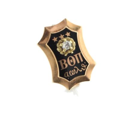 Fraternity badge, black enamel panel set with an old cut diamond, above Cyrillic (probably Russian) script, the reverse with 